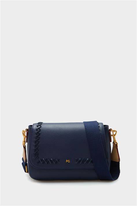 Bolso azul Purificación García con pompones
