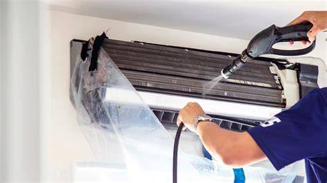 limpieza de filtro de aire acondicionado con agua