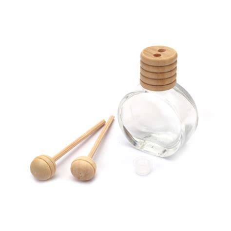 Frasco de mikado con varillas de madera